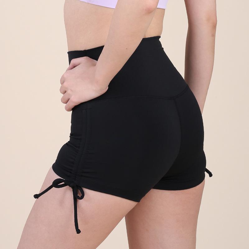 

Sports shorts drawstring yoga nude drawstring hot pants women s running hip lift fitness three-point yoga pants Small size (80-55kg recommended) чорний