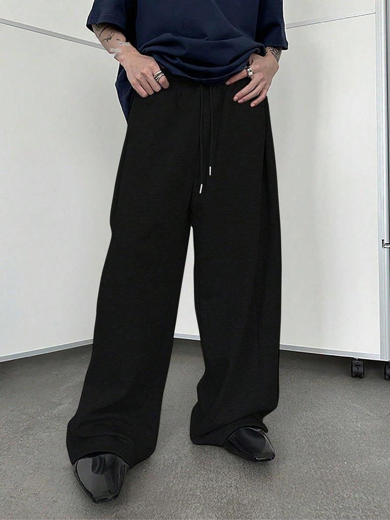 Men's Loose Fit Sweatpants with Drawstring Waist, Straight Wide Legs & Pockets Sportswear