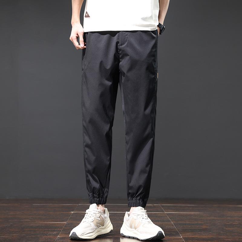 

Мужские спортивные брюки Ice Silk на весну/лето — универсальные, удобные, дышащие, свободного кроя, повседневный стиль. M (110 lbs) чёрный