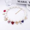 Simple and fashionable Baroque imitation pearl drip oil alloy love insect flower pendant women's collarbone chain