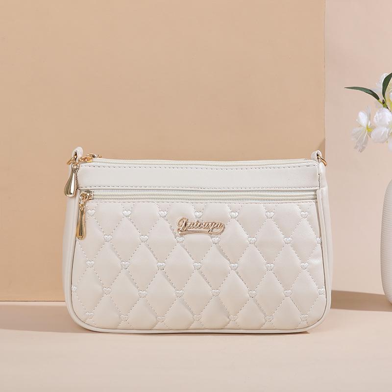 New summer simple fashion solid color embroidered messenger bag tide