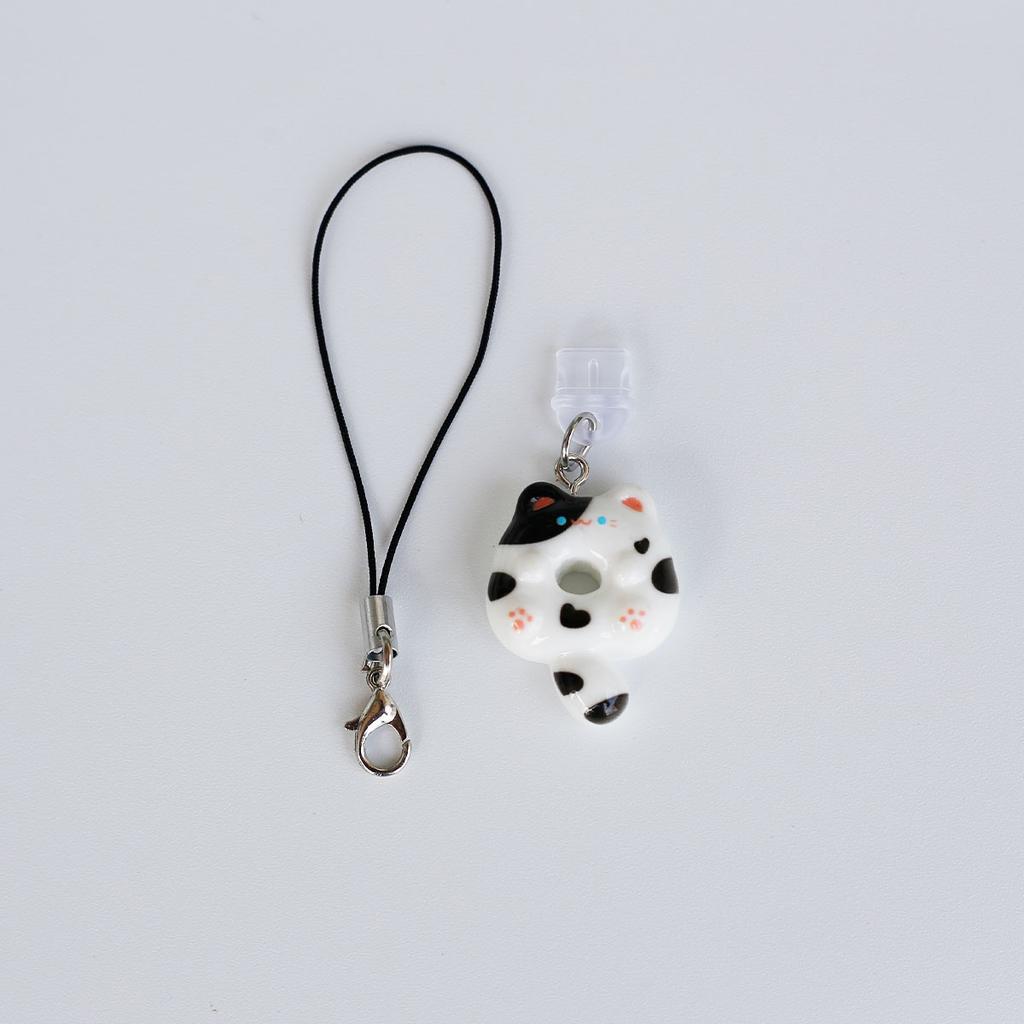 Κρεμαστό κόσμημα σκόνης κινητού τηλεφώνου χαριτωμένο ντόνατ αξεσουάρ γάτας διακόσμηση για θύρα Iphone τύπου c με κορδόνι για την αποφυγή απώλειας