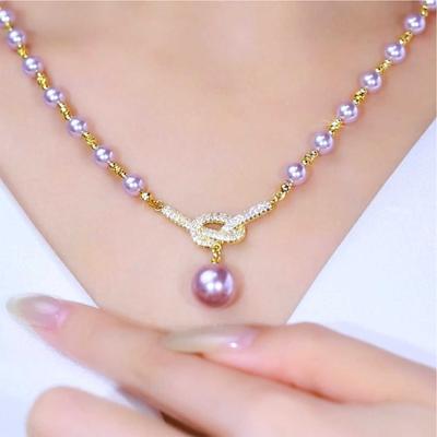 Collier de perles ajustable hypoallergénique avec accent de cristal et design délicat de nœud pour occasions spéciales, événements en soirée