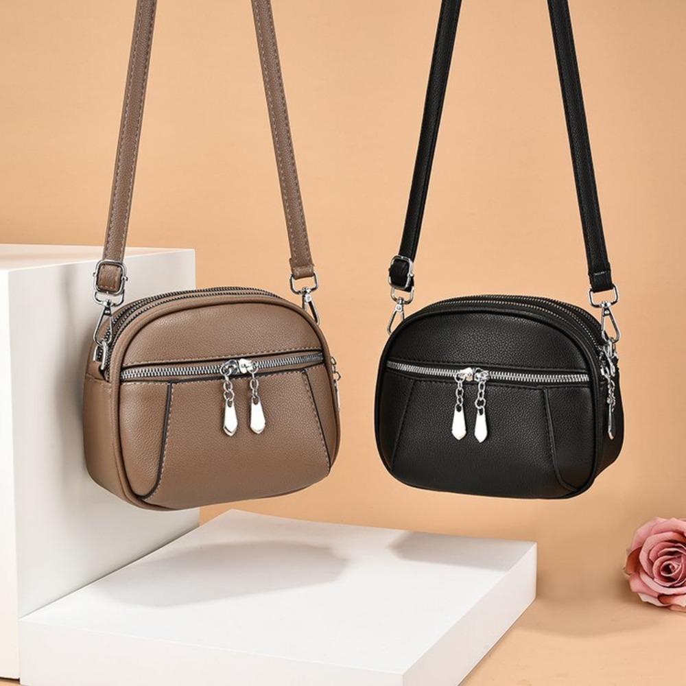 2026 New Summer Small Single Shoulder Messenger Bag Women's Three-Layer Round Luxury Simple Messenger Bag Cowhide Zero Wallet