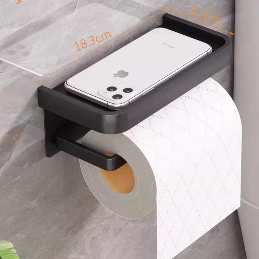 Nástěnný držák na kapesníky s poličkou na telefon