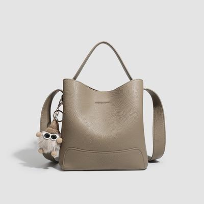 Trendig och enkel handhållen hinkväska Stor kapacitet Mångsidig pendling Enkel axel Crossbody-väska
