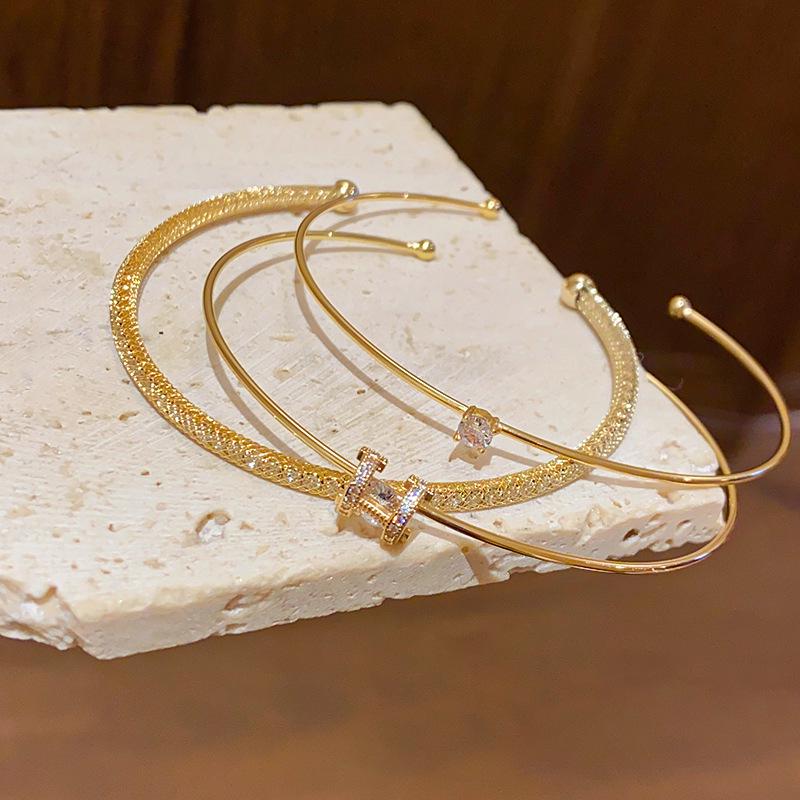 

Gold Plated Zircon Geometric Bracelet Set: Luxe, Stackable Bangles for a Sophisticated Look