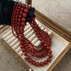 Collar de cuentas de vidrio rojo Ankola cadena para clavícula de temperamento de lujo ligero retro francés cadena de suéter de alta gama mujer