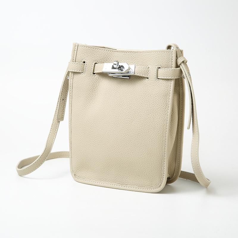 

Белое облако Женская сумка Текстура Ручная сумка для телефона Верхний слой Коровья кожа Маленький дизайн Толпы Одинарная кожаная сумка Женская Высококлассная текстура 22x8x17.2cm белый