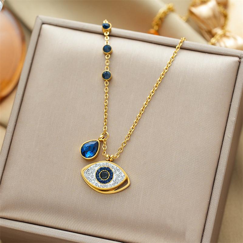 Goldene 316L Edelstahl Nazar-Anhänger Halskette mit blauen Edelsteinen und funkelnden Zirkonia für Damen