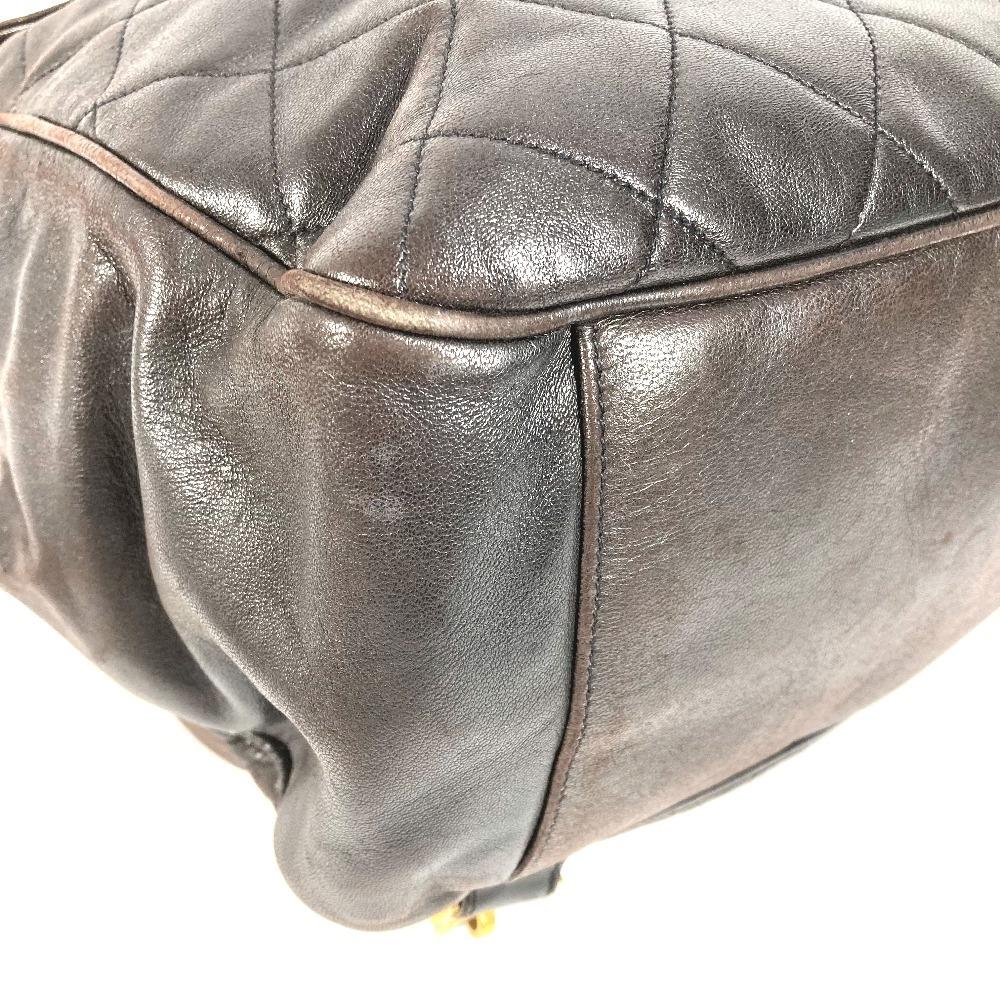 Chanel Plecak z łańcuszkiem ze sznurkiem ściągającym, pikowany matelassé, vintage, ze skóry jagnięcej, czarny