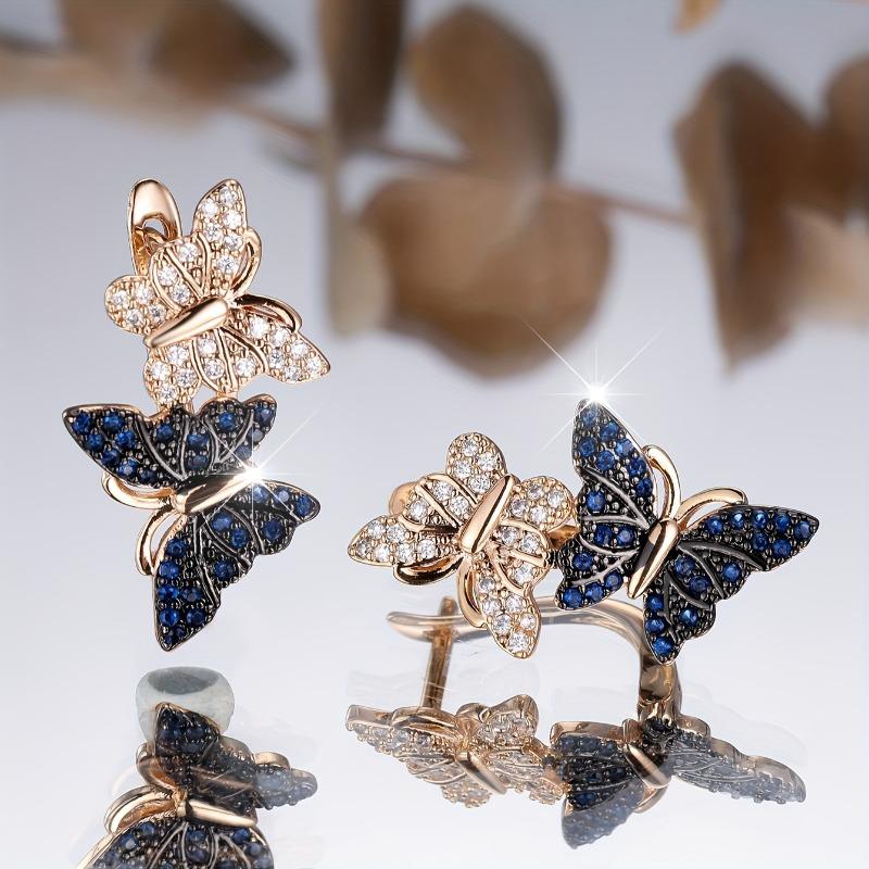A Pair of Elegantly Styled Butterfly Hoop Earrings Perfect for a Able Party.