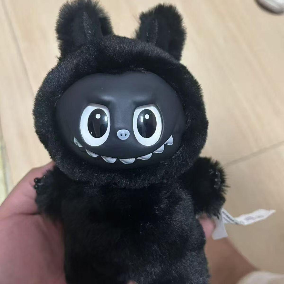 

Африканская версия Labubu Черный Labubu Пушистая кукла Поп чёрный