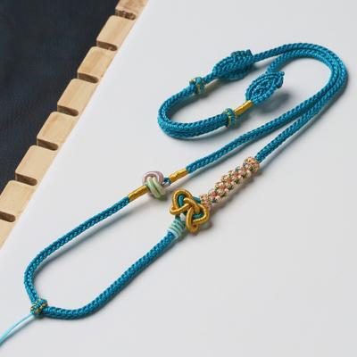 Hand-Woven Eight-Strand Jade Pendant Necklace with Gold Eight-Treasures Compass and Peace Buckle
