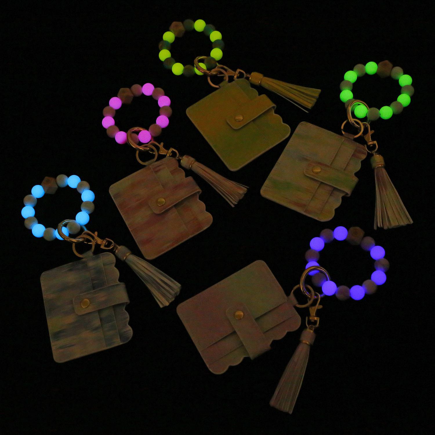 

Luminous Silicone Wrist Keychain with Leather Tassel and Card Holder Keyring