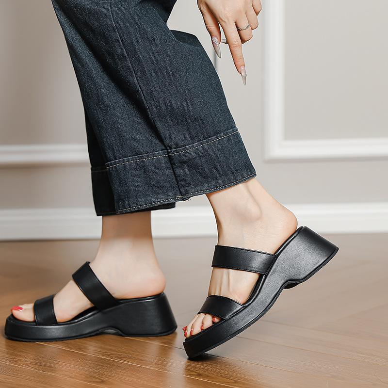 Thick-soled muffin wedge slippers summer wear French temperament fashion versatile one-word open-toe high-heeled beach shoes