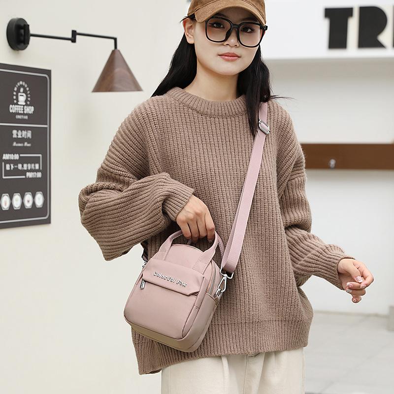 

New women s fashion trend shoulder bag multi-layer mobile phone change bag anti-splashing small bag