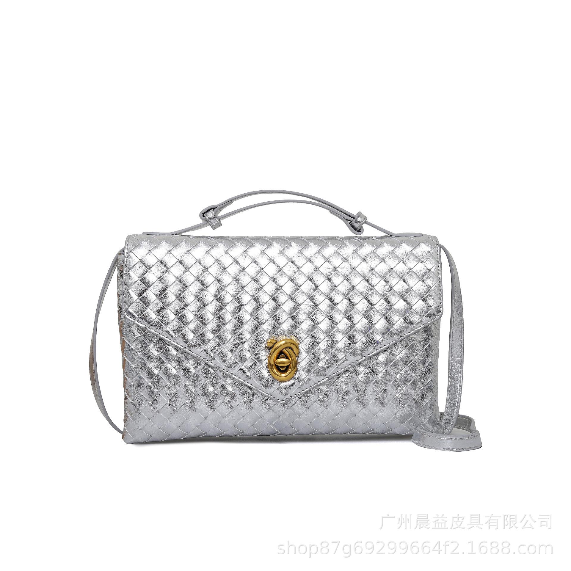 

2025 spring new leather woven small square box women s bag fashionable and versatile with lock design large capacity can be hand серебряный