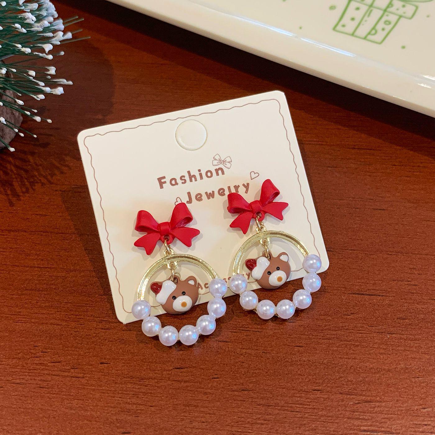 

Holiday Snowflake Bear & Pearl Earrings: Exquisite Silver Needle Design for Women