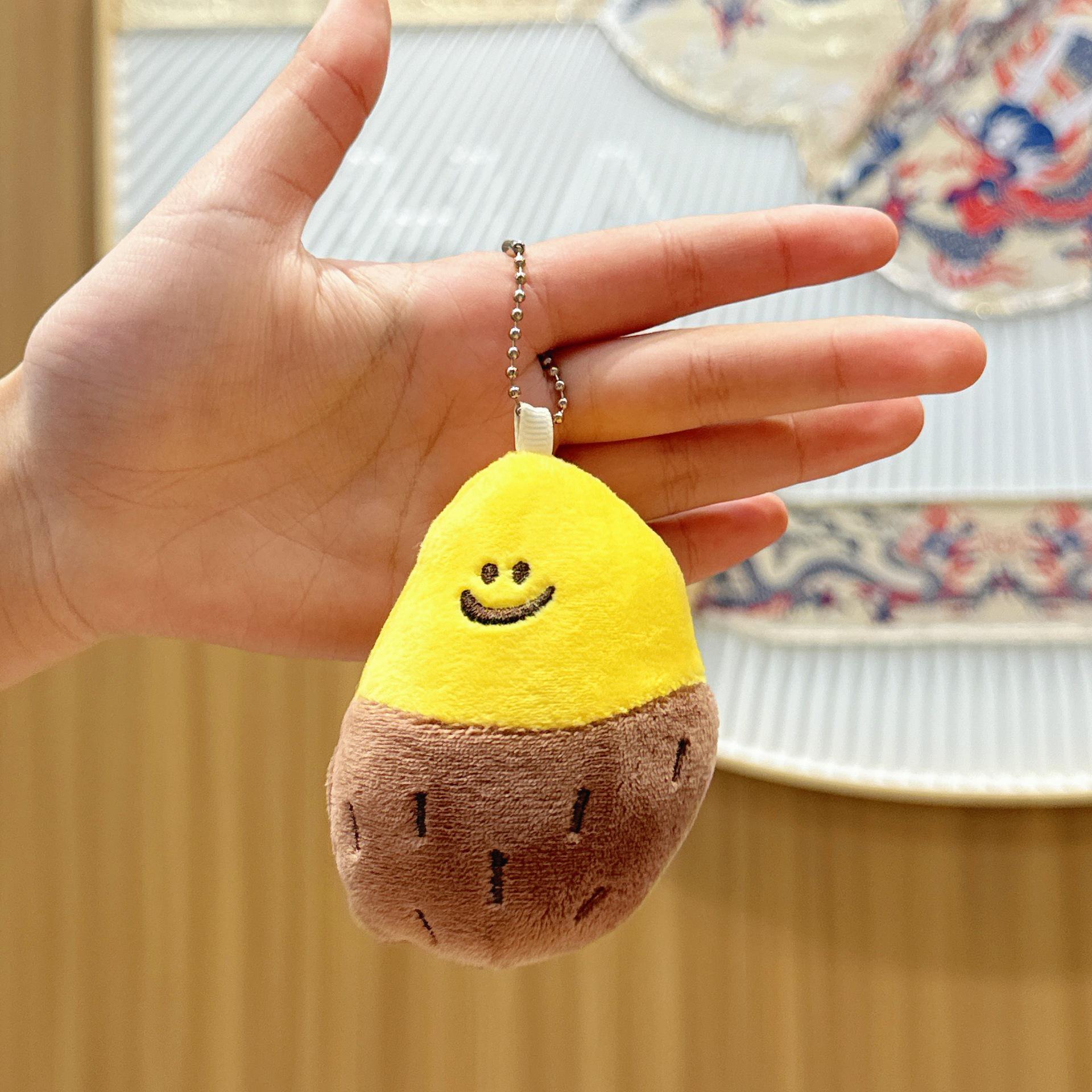 

Милый плюшевый кулон в виде ошеломляющего сладкого картофеля Approximately 9 cm tall