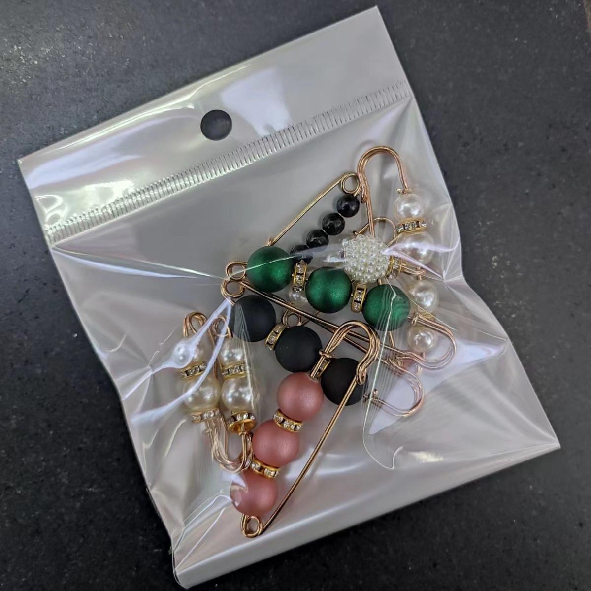 

Регулируемая пряжка-булавка для одежды - Брошь против оголения для женских брюк