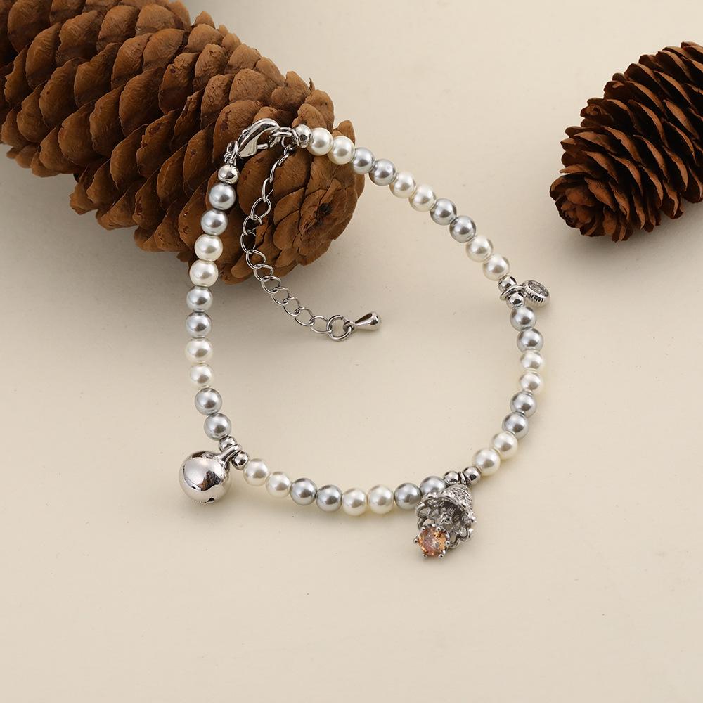 

Lily of the Valley Pearl Bracelet with Jingle Bell Pendant - High-End, Versatile Beaded Hand Jewelry