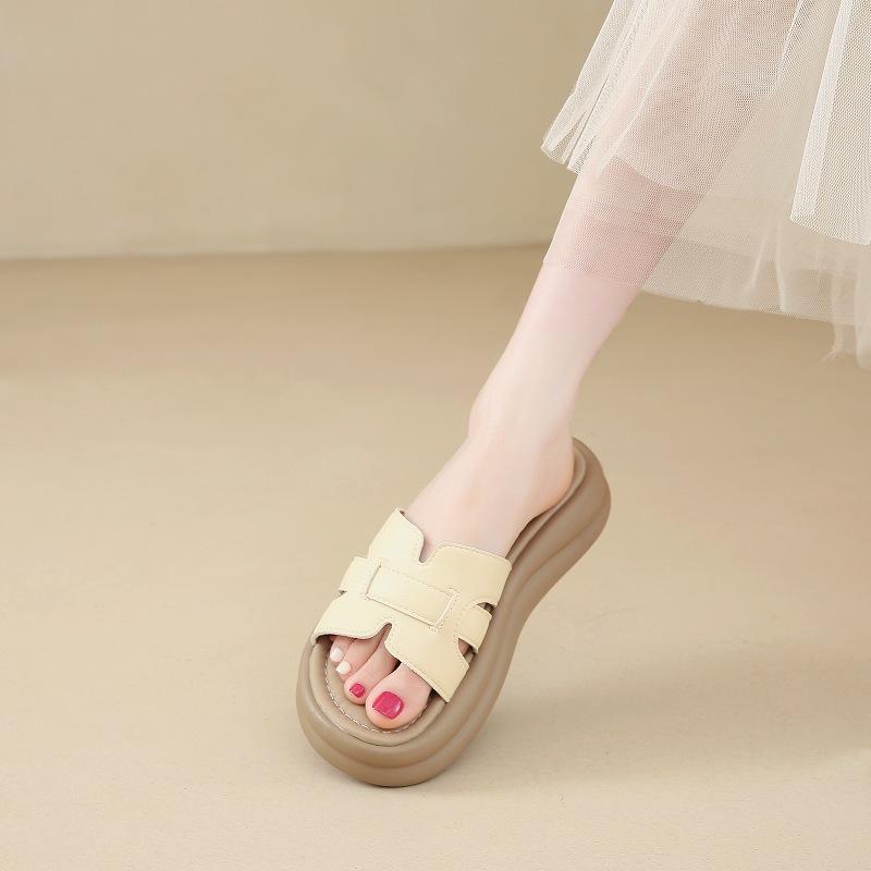 Retro French one-word slippers women's summer wear 2025 new heightening flat-bottomed seaside vacation sandals casual sandals