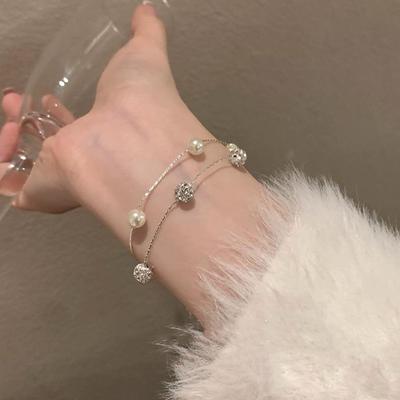 2025 Gypsophila Doppelschicht Perlen- & Diamantarmband für Damen - Leichter Luxus, High-End Nischendesign