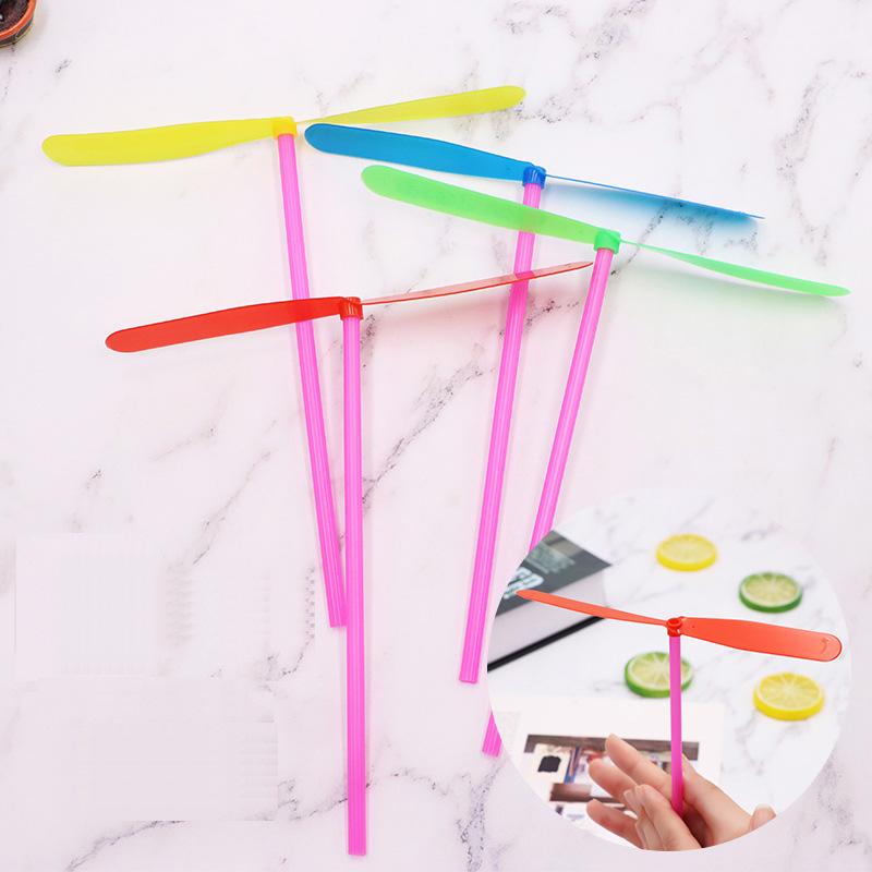 

10 Pcs/Set Kids Outdoor Classic Toys Plastic Bamboo Dragonfly Hand Rubbing Flying Propeller Children s Game
