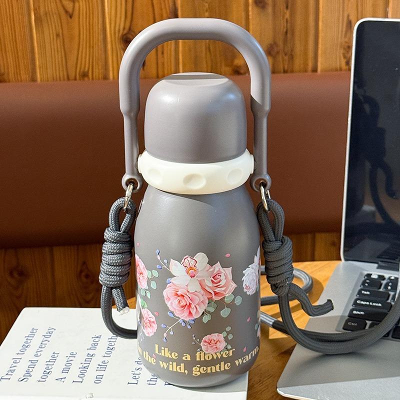 

Креативна термос-пляшка з квітами та кришками-соломками. Портативний термос для жінок. 316 Нержавіюча сталь. Ізольована. Для гарячих та холодних напоїв. Дорожня чашка 680ml сірий колір