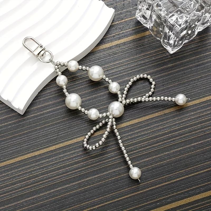 

Holiday party small gifts, birthday gifts, high-end pearl bow hanging chain bags, keychains, phone cases, pendants