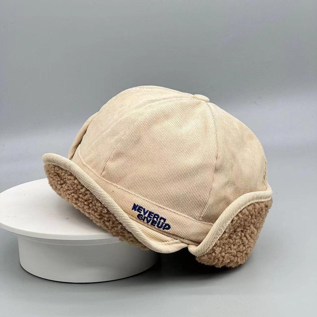 Fleece-lined, warm, and ear-protecting baseball cap for women, featuring letter embroidery and corduroy fabric, designed for cold weather