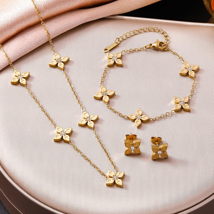 18K Gold Four-Leaf Clover Rhinestone Jewelry Set: Titanium Steel Bracelet, Necklace, and Earrings for Women