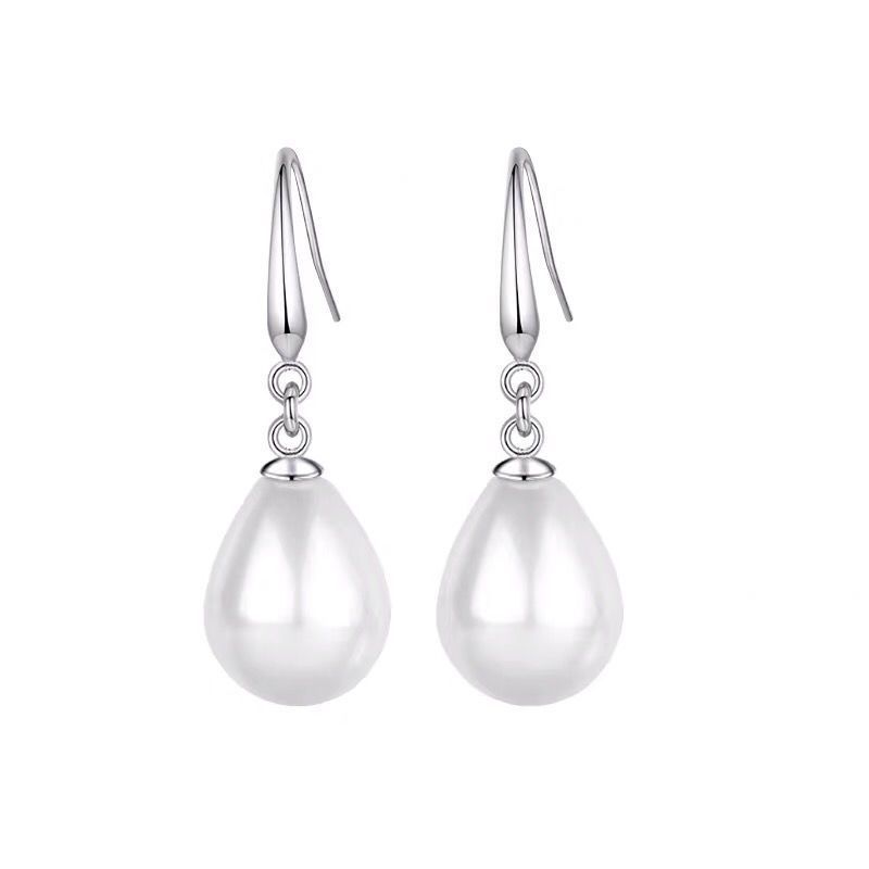 Damskie kolczyki wiszące z czerwonymi perłami