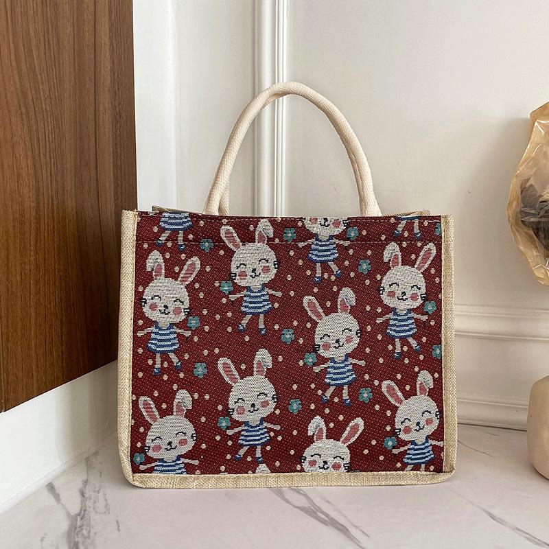 

2025 new summer large-capacity student tote bag casual cartoon canvas tote bag рожевий
