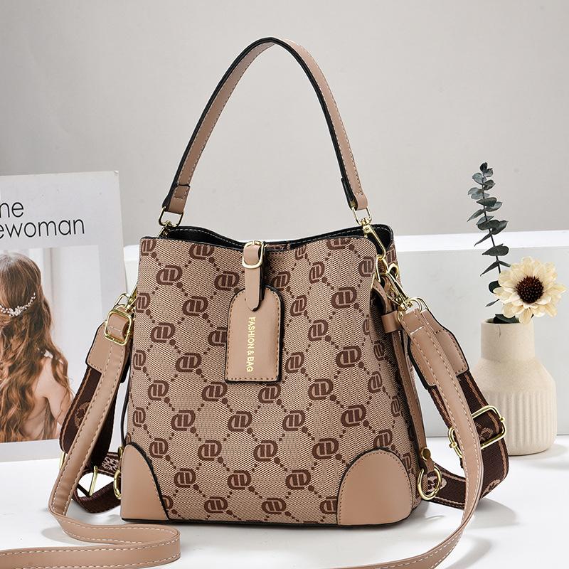 2026 new belt decoration women's portable shoulder messenger bag large capacity bucket bag women