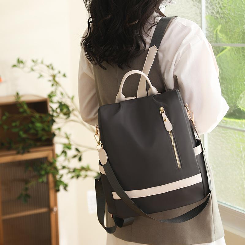 Anti-theft backpack women s spring new Korean version fashion large-capacity Oxford cloth backpack leisure travel backpack серый