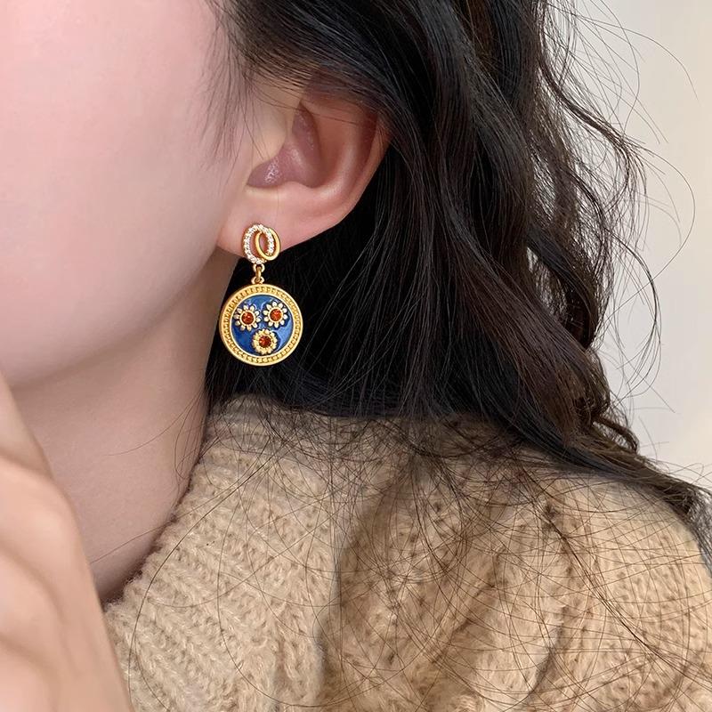 Vintage Srebrne Kolczyki Okrągłe z Diamentami i Kroplami Oleju: Retro, wykwintne i luksusowe dla kobiet