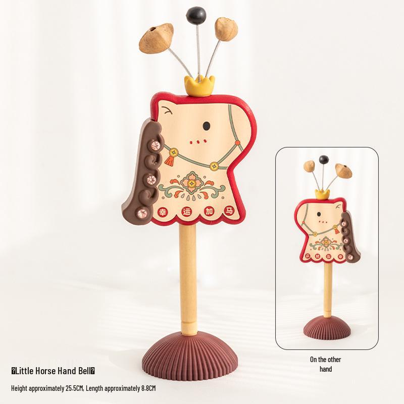 

A ying Quirky Horse-Themed Desk Ornament and Decompression Bell Toy for Kindergarten.