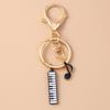 Niedlicher Emaille Mini-Klavier Schlüsselanhänger Simulation Musikinstrumente Schlüsselring Anhänger Damen Mädchen Handtaschen Dekoration DIY Schmuck Geschenk