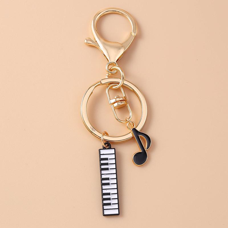 Niedlicher Emaille Mini-Klavier Schlüsselanhänger Simulation Musikinstrumente Schlüsselring Anhänger Damen Mädchen Handtaschen Dekoration DIY Schmuck Geschenk
