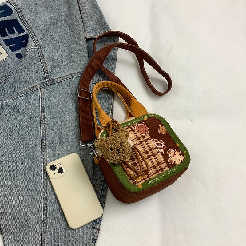 Cartoon small bag 2025 new Japanese cute girl niche plaid versatile single shoulder portable messenger small square bag