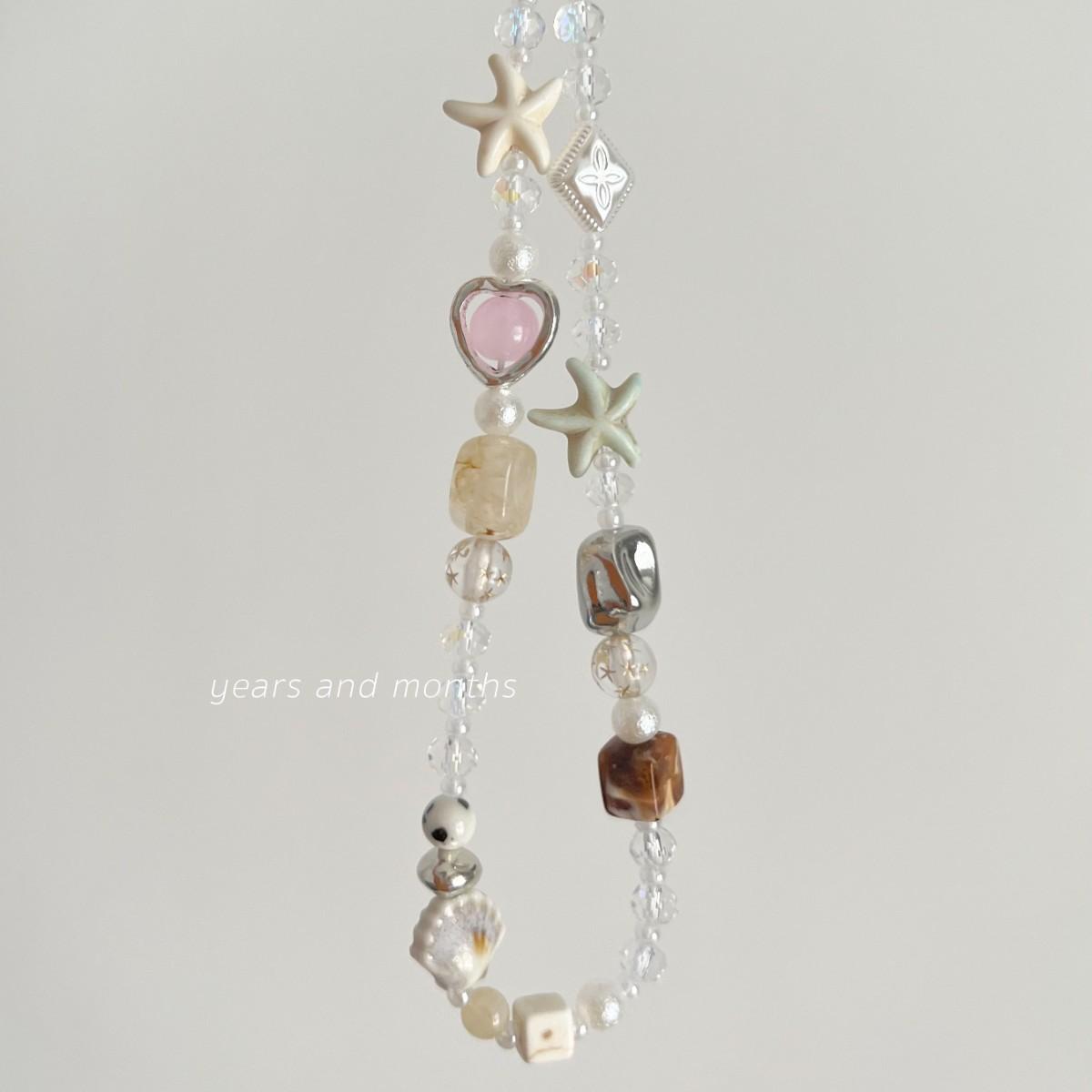 

Years and months Island Sweetheart Phone Chain Lanyard Pendant Camera Beads Island Sweetheart