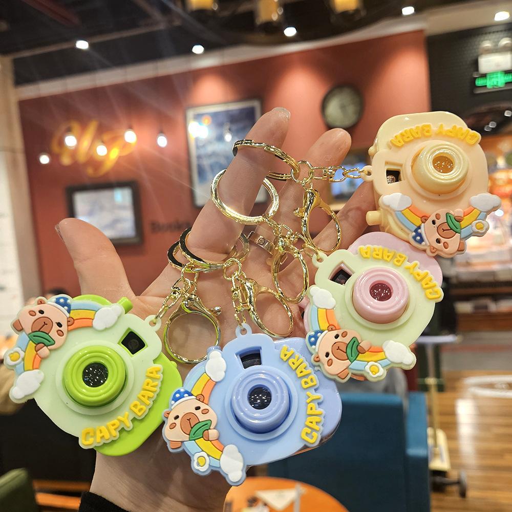 Niedliche Mini-Projektionskamera Cartoon Leuchtendes Projektionslicht Damenhandtasche Schlüsselanhänger Anhänger