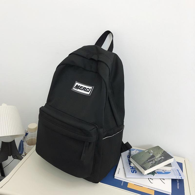 High-value schoolbag female Japanese ins large-capacity backpack solid color high school college student simple backpack