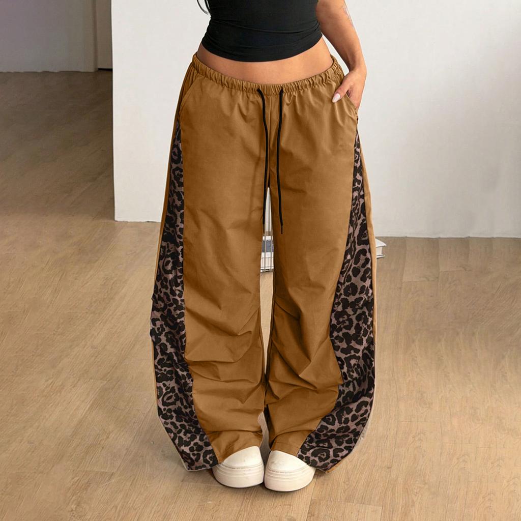 Pantaloni da donna a gamba larga con stampa leopardata, vita elasticizzata e fluidi, per abbigliamento casual