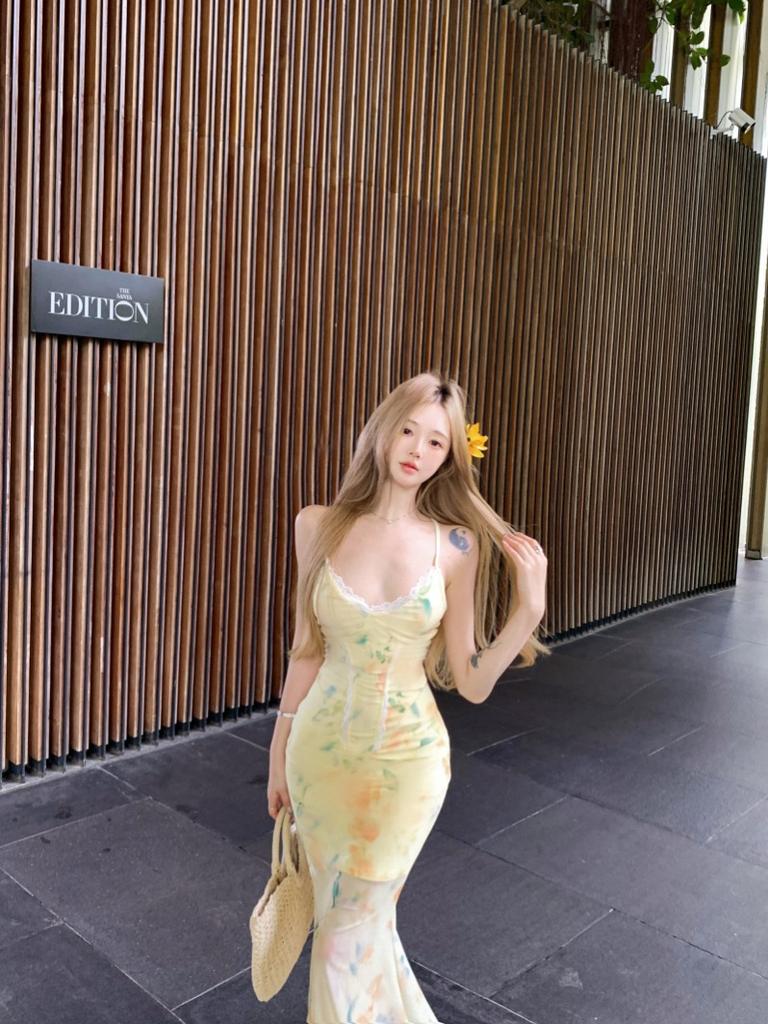 Urlaubsstil Träger rückenfreies Latzkleid Damen Sommer Blumenkleid Spice Girl Taille Fishtail Rock Hüftwickelkleid