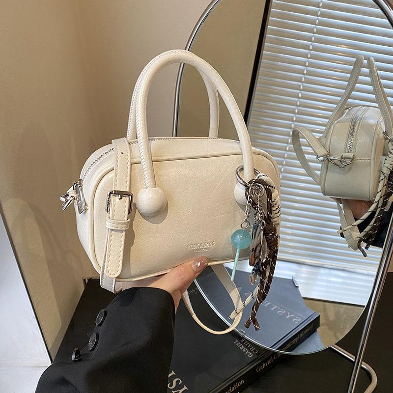 Hand-held bowling bag 2025 new fashion simple shoulder bag high-end niche women's bag