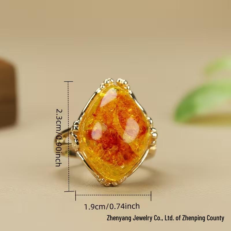 Anillo unisex ajustable de ámbar en amarillo miel con detalles en oro rosa