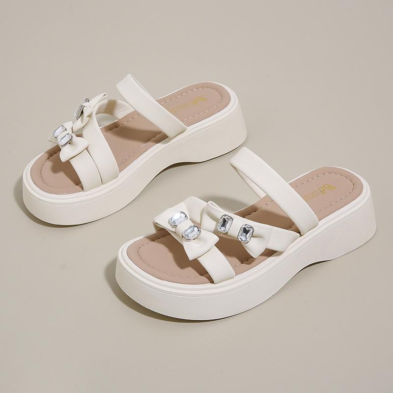 688-10 Two women in cool slippers 2025 new summer fairy wind flat bottom one-word drag Roman beach sandals